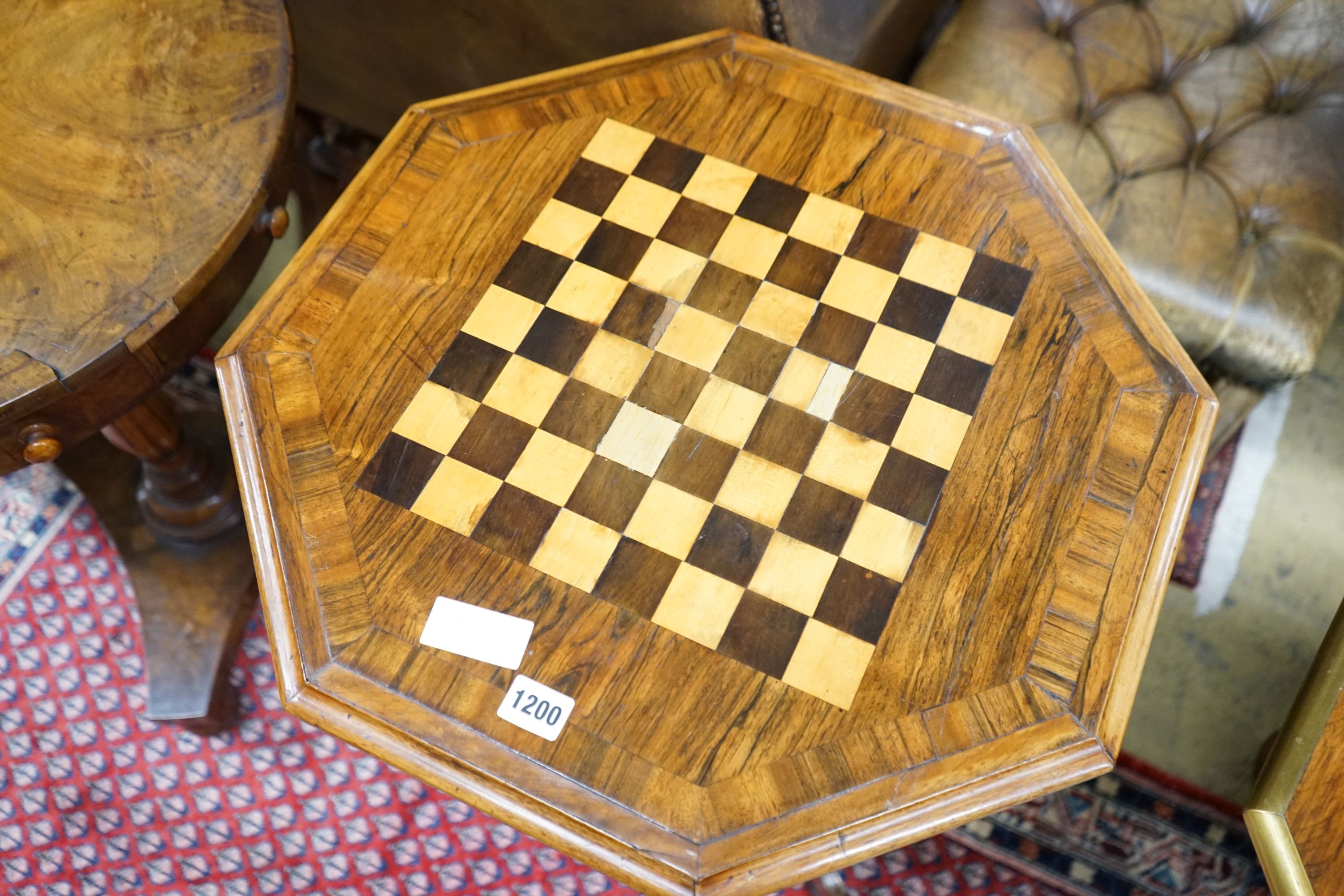 A Regency style brass mounted octagonal rosewood tripod games table, width 52cm, height 72cm